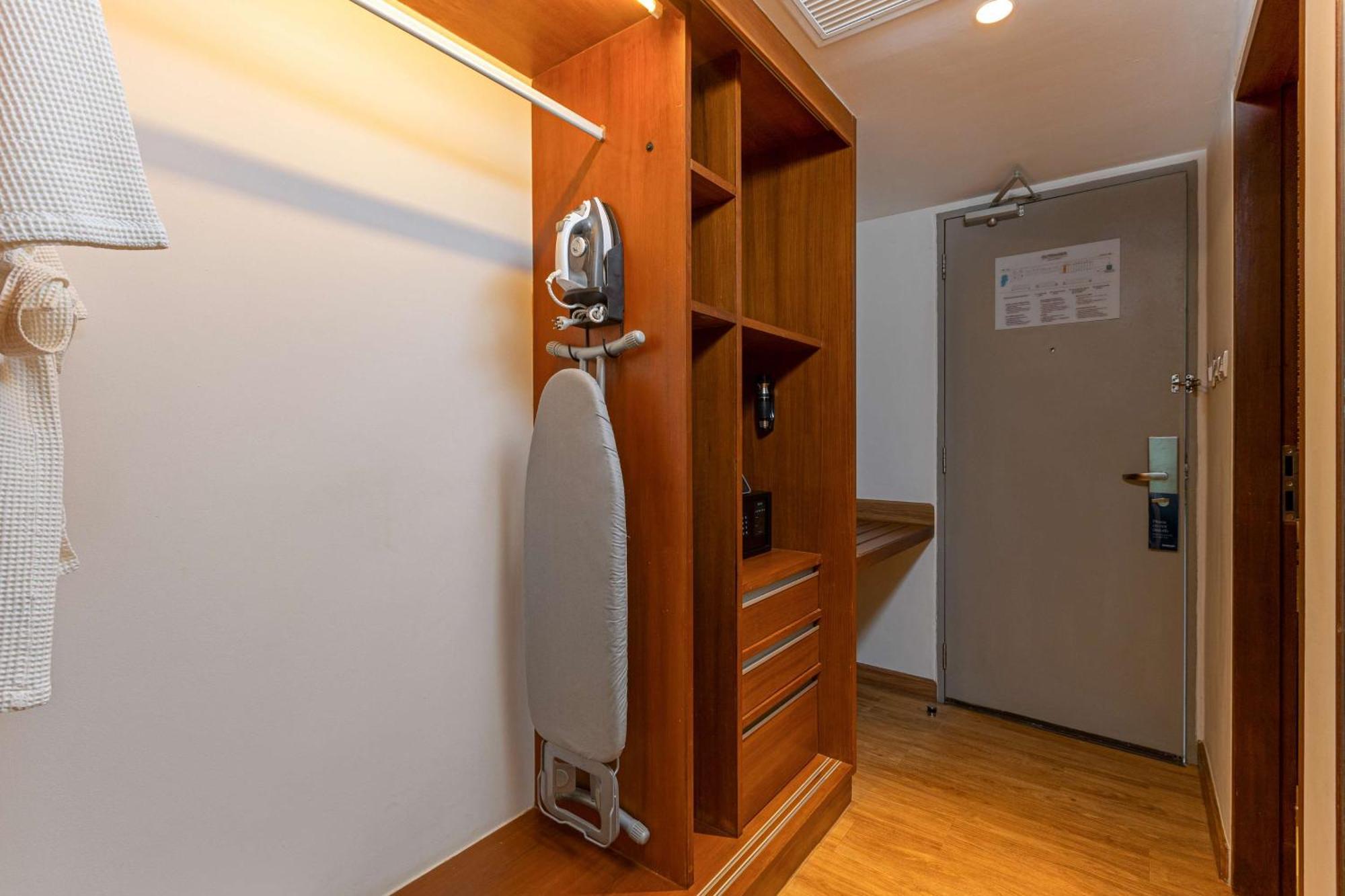 Outrigger Khao Lak Beach Resort - Sha Extra Plus Εξωτερικό φωτογραφία A steam iron and ironing board in a hotel room