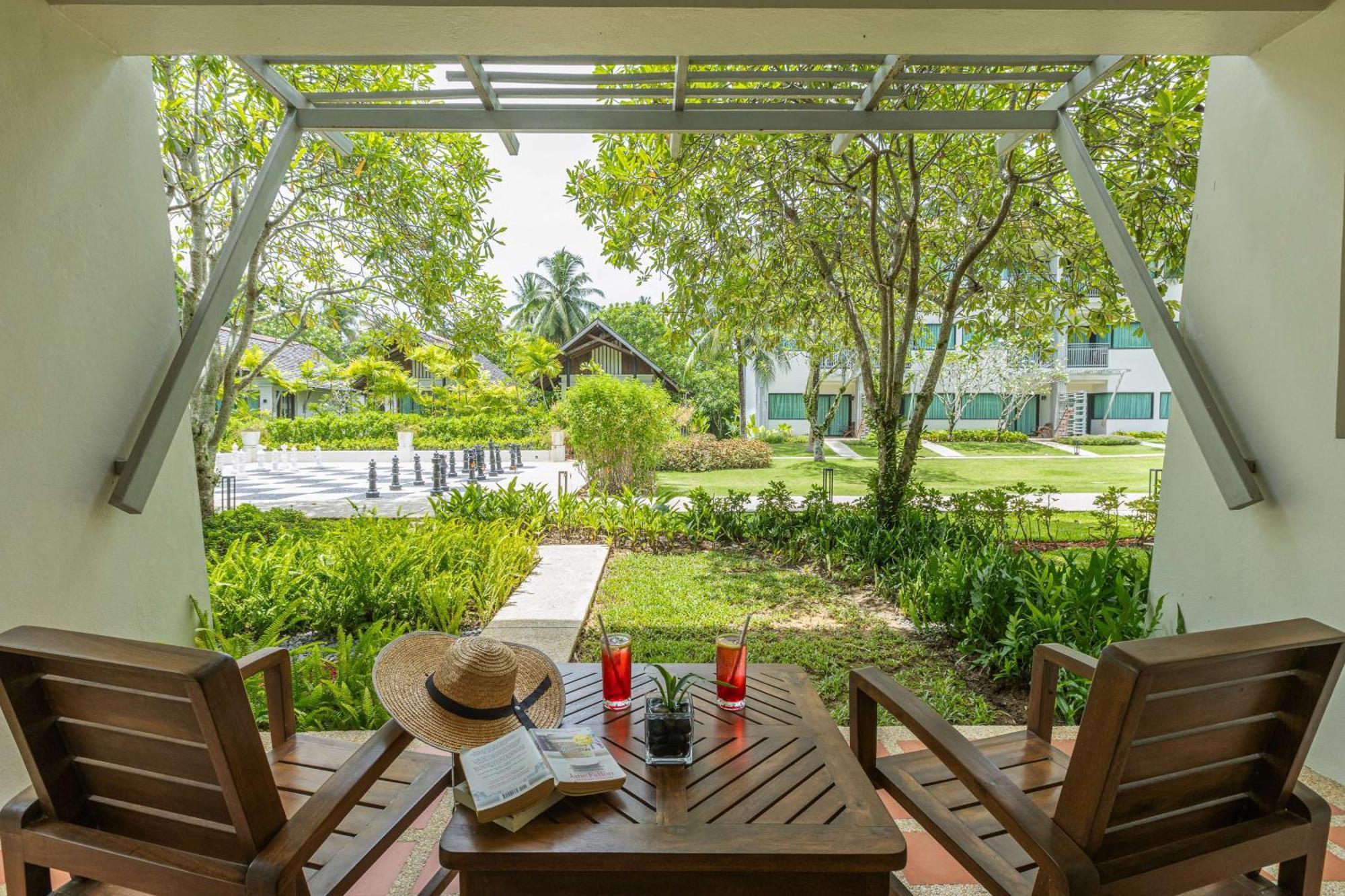 Outrigger Khao Lak Beach Resort - Sha Extra Plus Εξωτερικό φωτογραφία The resort's garden